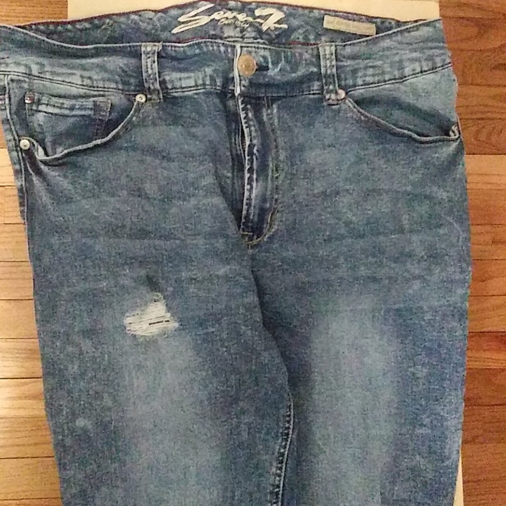 Stonewashed ripped jeans